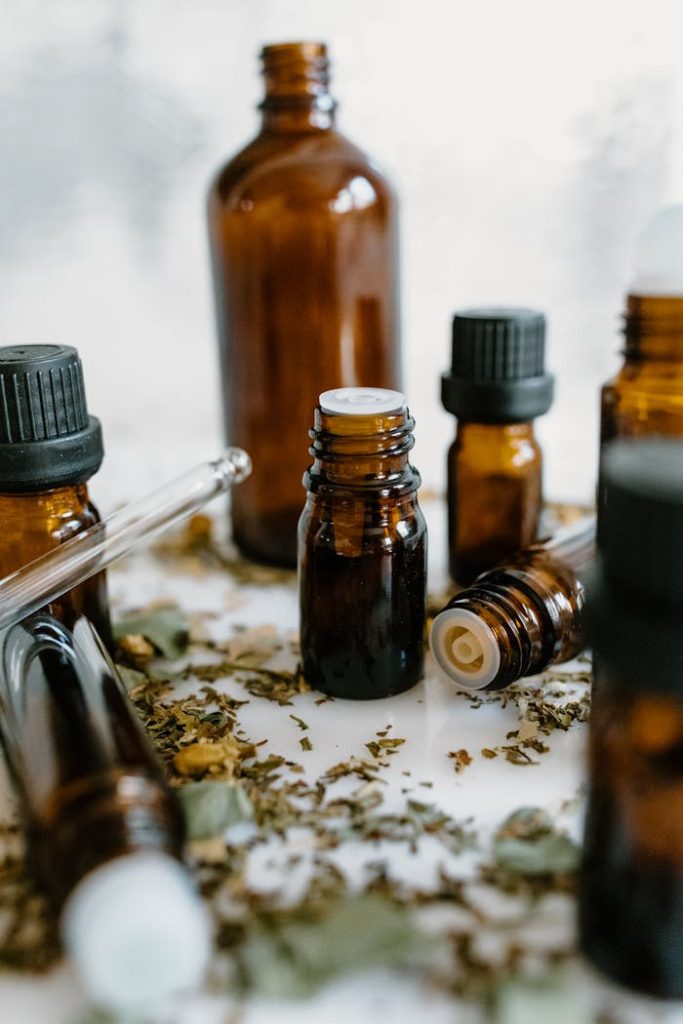 Hello world! A close-up of amber bottles with essential oils, showcasing natural healing properties.